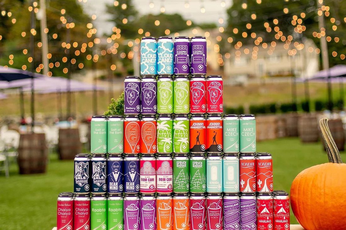 A towering pyramid of Mighty Squirrel beer cans