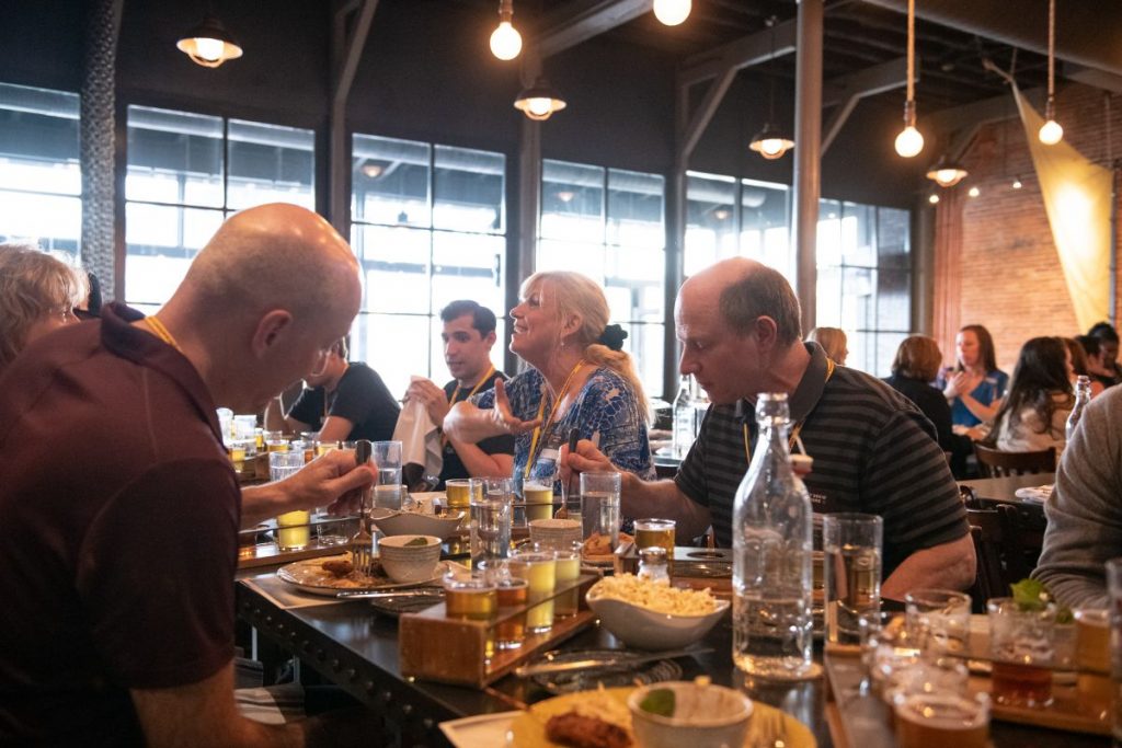 City Brew Tour guests enjoy a meal and beer pairing