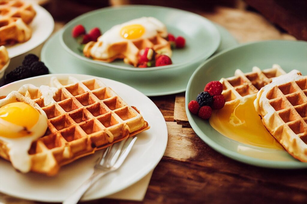 Delicious waffles with a runny egg and fresh berries, perfect for a brunch or breakfast during a bachelorette party.